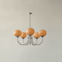 Lustre cinq lumières finition chrome et abat-jours orange