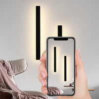 Applique murale extérieure LED pilotée depuis un smartphone dans un salon