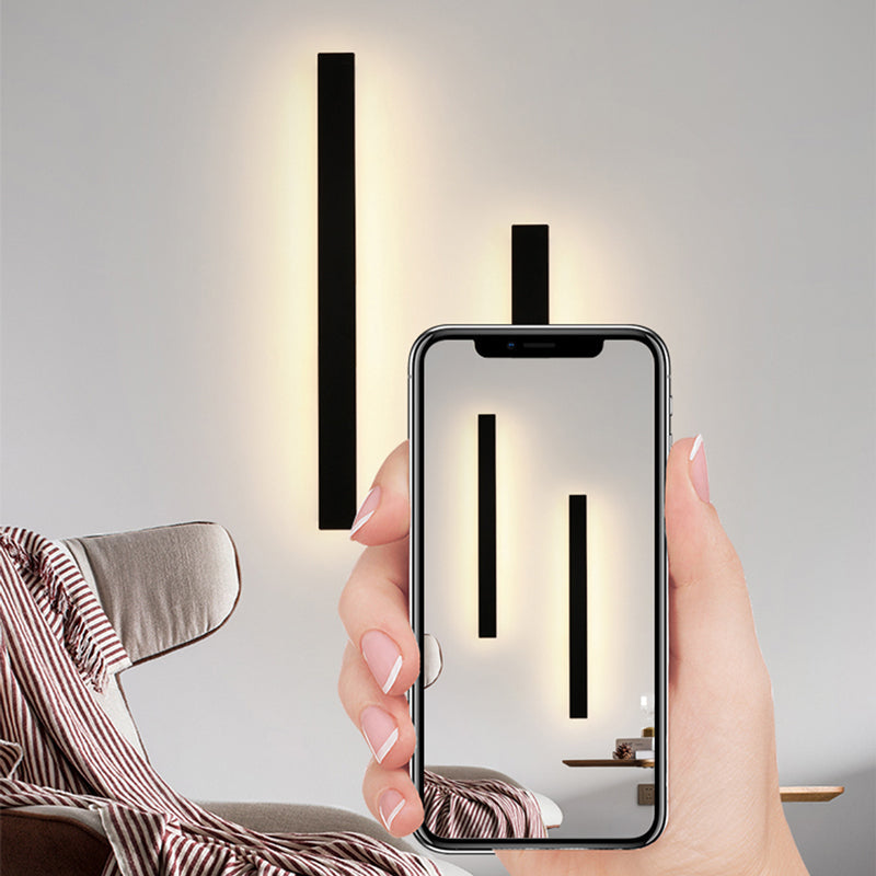 Applique murale extérieure LED pilotée depuis un smartphone dans un salon