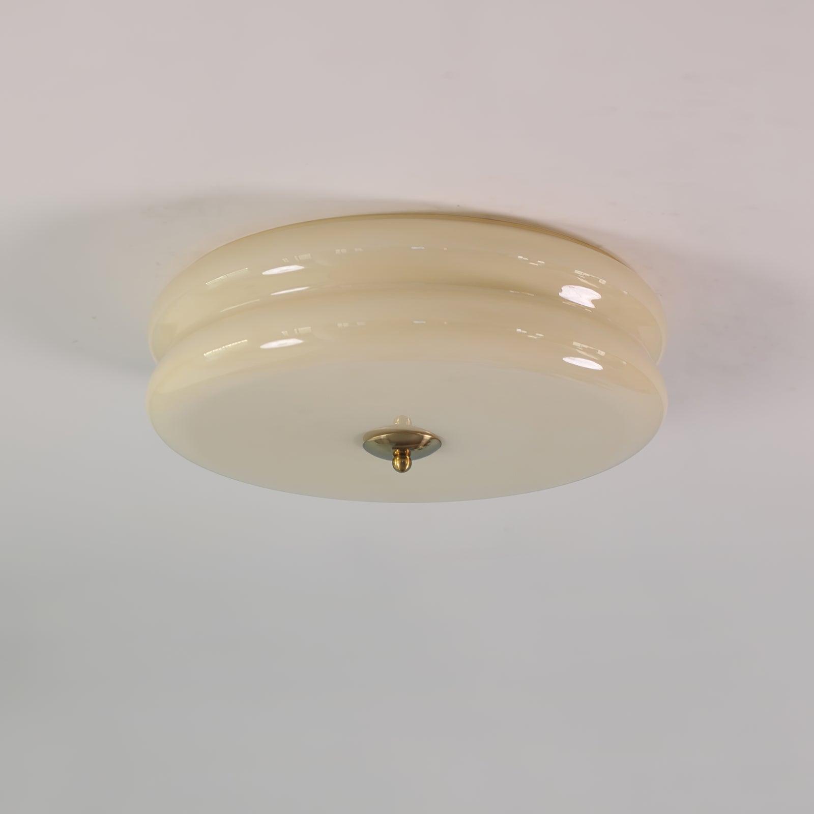 Plafonnier art déco finition or et abat-jour beige