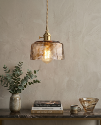 Suspension verre ambré vintage suspendue par son câble en tissu torsadé