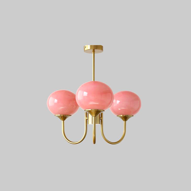 Lustre trois lumières finition cuivre et abat-jours roses