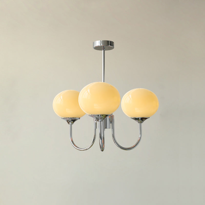 Lustre trois lumières finition chrome et abat-jours crème