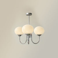 Lustre trois lumières finition chrome et abat-jours blancs