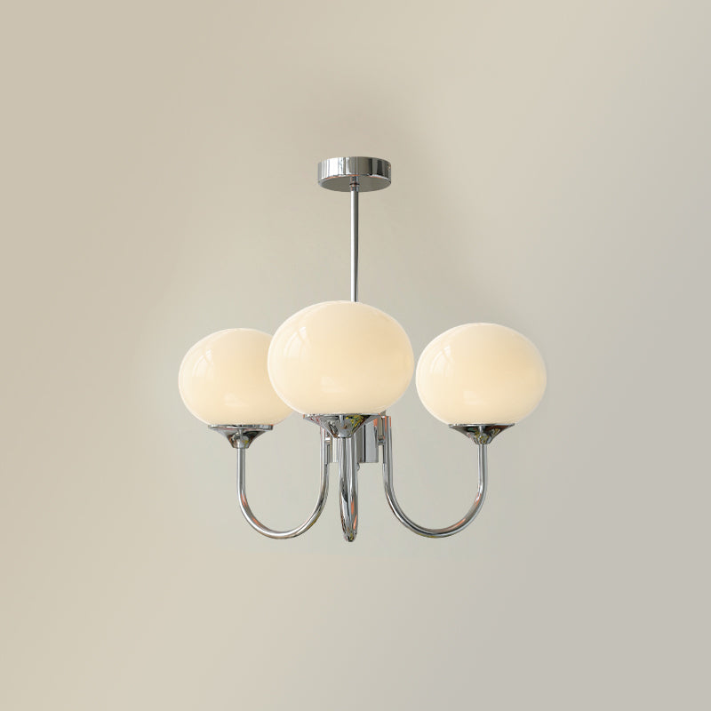 Lustre trois lumières finition chrome et abat-jours blancs