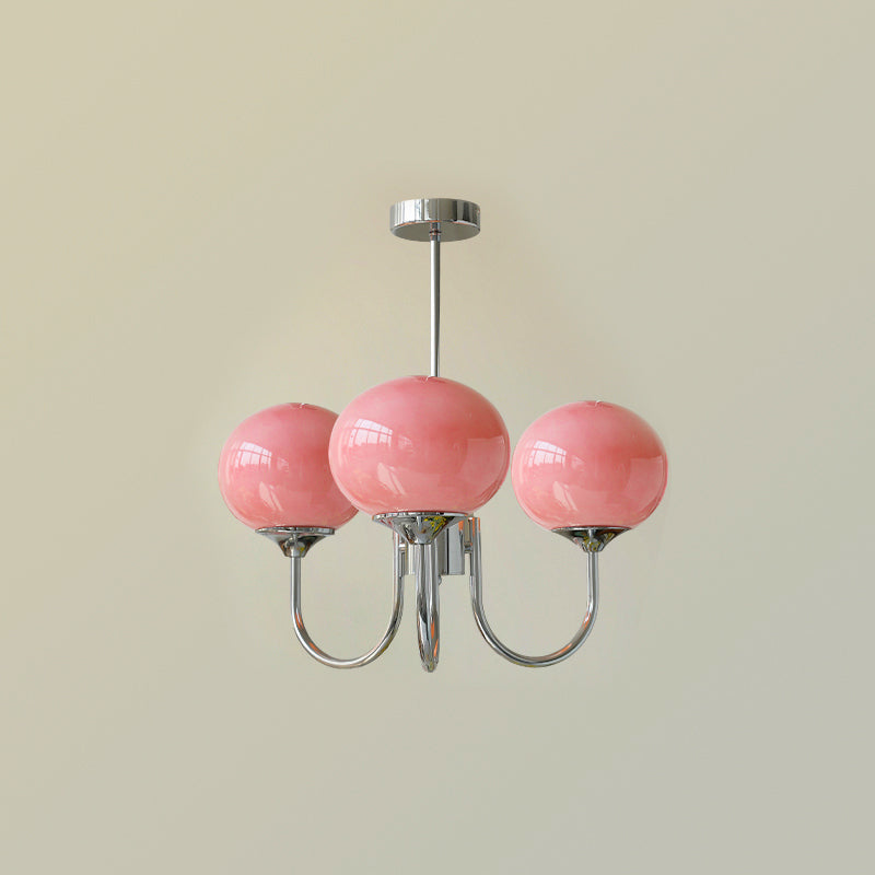 Lustre trois lumières finition chrome et abat-jours roses