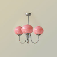 Lustre trois lumières finition chrome et abat-jours roses