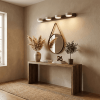 Applique en travertin dans une entrée au-dessus d'une console en bois