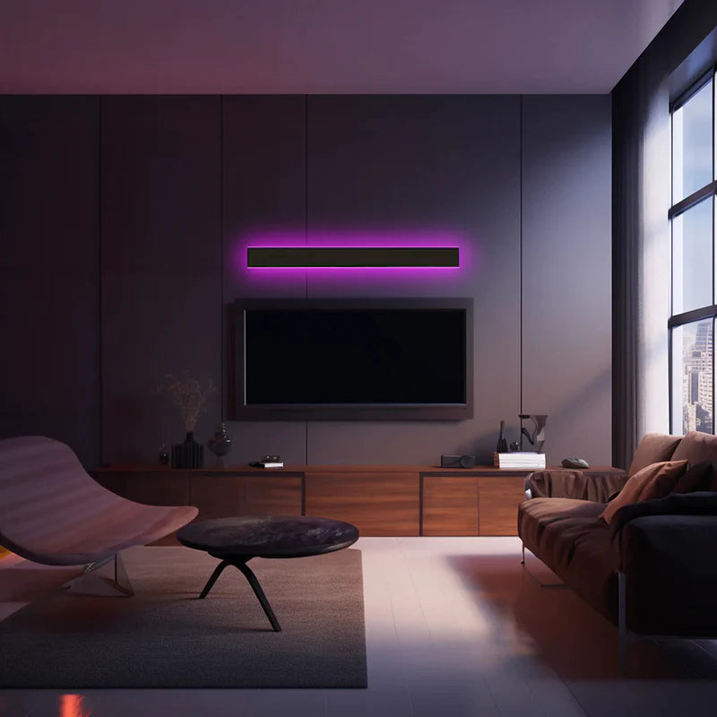 Applique murale extérieure LED RGB créant une ambiance colorée dans un salon
