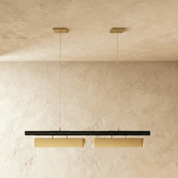 Lustre led 2 têtes vue rapprochée, diffuseurs laiton sous barre noire