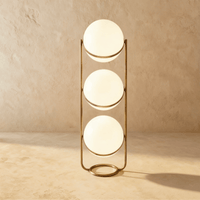 Lampadaire design à trois étages finition laiton vintage