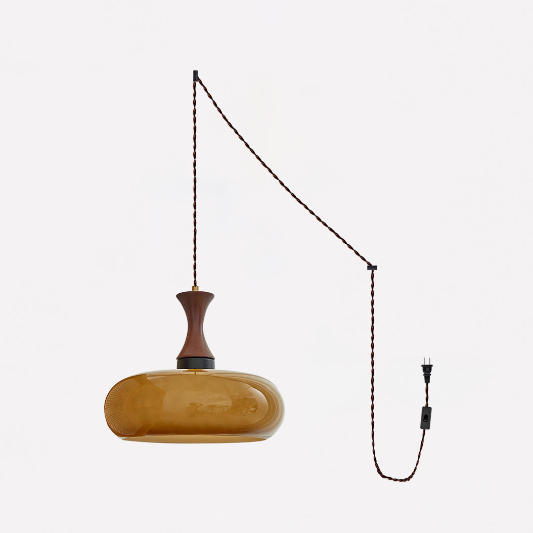 Suspension baladeuse en verre coloris ambre avec cordon et prise