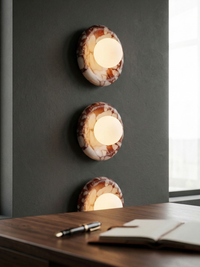 Applique murale en marbre diffusant une lumière douce sans éblouissement